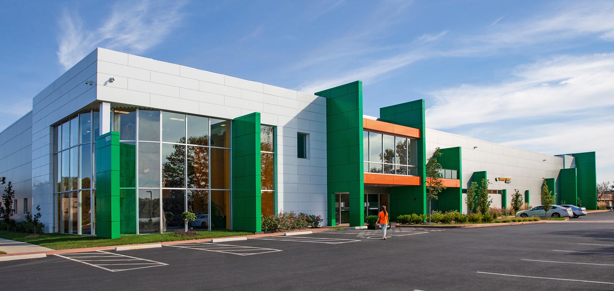 Rockin' Jump indoor trampoline park with pre-engineered metal building systems, storefront glazing and family entertainment venue design.