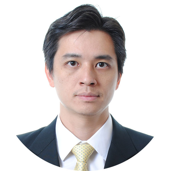 Jirath Chenphuengpawn portrait photo an Asian man with short black hair in a suit with a white shirt and patterned yellow tie