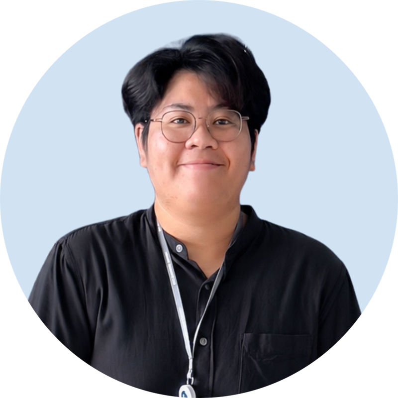 ID photo of a heavy-set young man with black hair and glasses