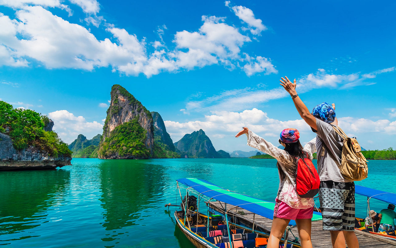 tourists at tropical island group