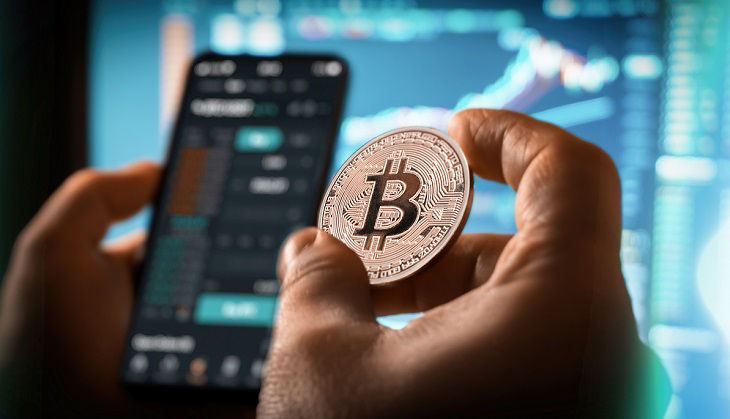 Day trader buying selling crypto currency bitcoin concept; Shutterstock ID 1916262404; purchase_order: BOT; job: ; client: ; other: 