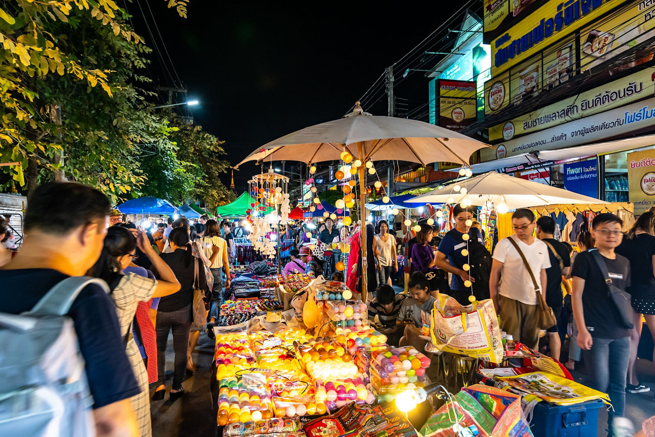 people in night market