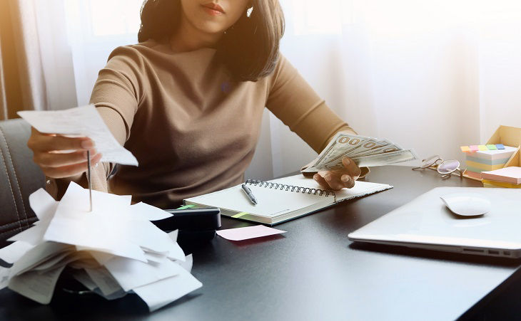 Asian woman is clear, manage for expenses, it's important of account and finance of company. By collect receipt document or slip to record on deadline for correct payment report with Dollars of USA; Shutterstock ID 1641437560; purchase_order: à¸ºBOT; job: ;