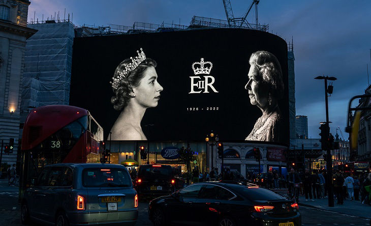 London, United Kingdom - September 9, 2022: The enormous photo of HRM Queen Elizabeth II at Piccadilly Circus in London