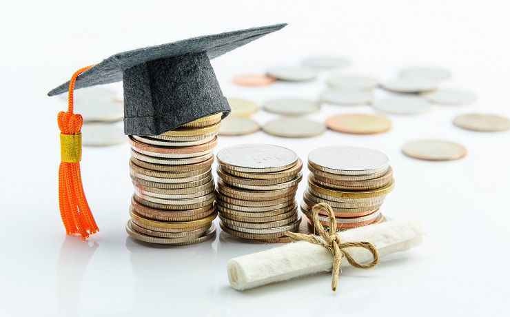 Money cost saving or money reserve for goal and success in school, higher level education concept : US dollar coins / cash, a black graduation cap or hat, a certificate / diploma on white background.