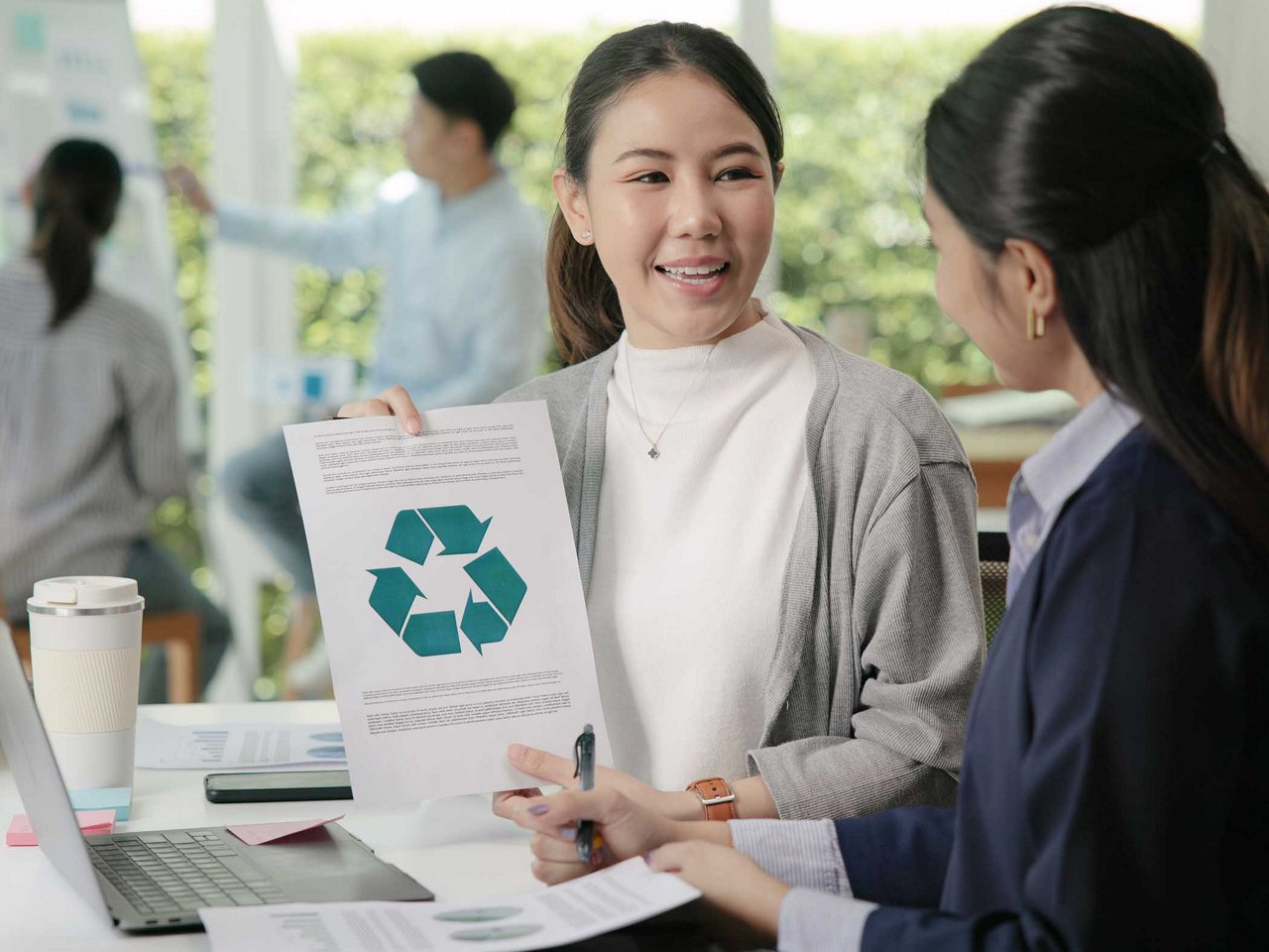 A car owner inspects his car.