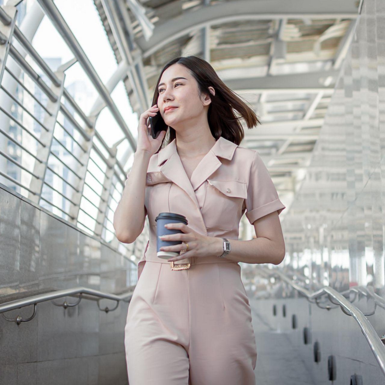 A smiling woman working.