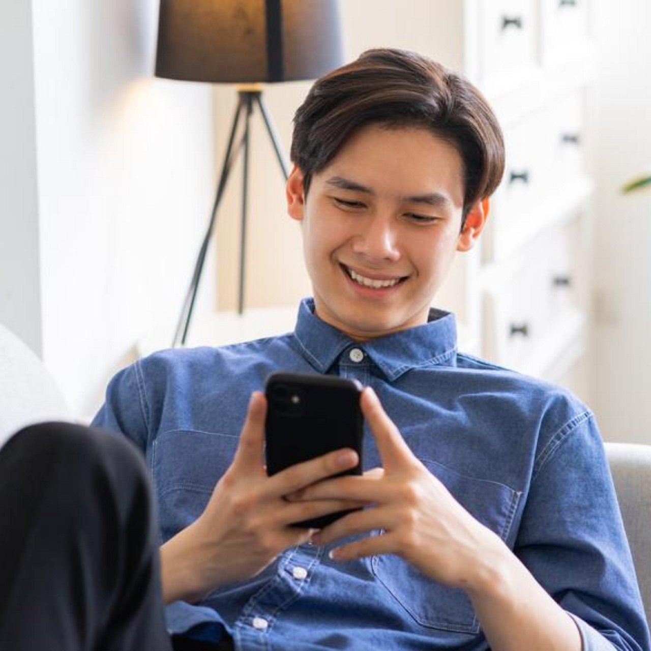 A man using his phone.