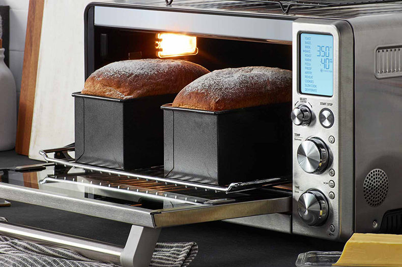 the Smart Oven Pro with two freshly baked loafs in oven