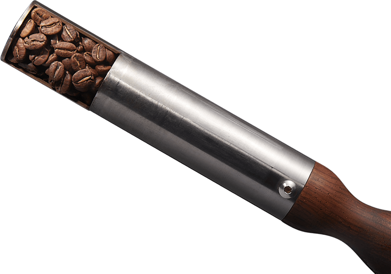 Coffee bean trier with beans in it.