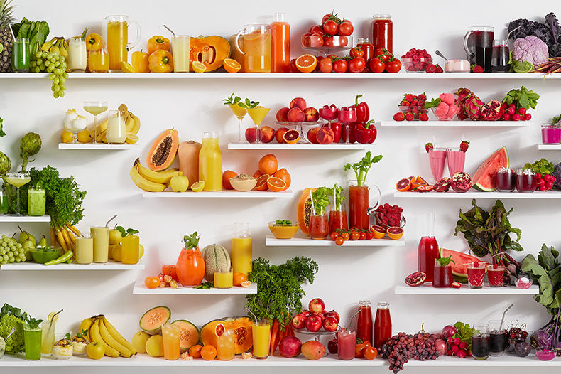A colourful shelf of fruits and vegetables