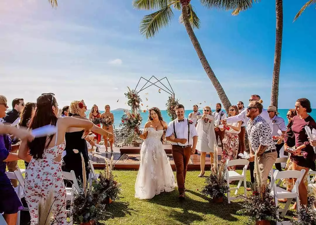 https://s7ap1.scene7.com/is/image/destqueensland/teq/consumer/global/images/destinations/the-whitsundays/blog-imges/editorial-hero-banner/2020_WYS_WhitsundaysWedding_Beaches_@nadinekempphotography.jpg?fit=wrap&fmt=webp&qlt=40&wid=1200