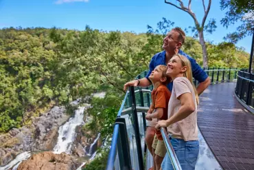 Family at the Edge Lookout with Barron Falls in the background Family at the Edge Lookout with Barron Falls in the background