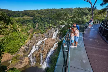 Family at The Edge lookout, looking out over the Barron Falls, Skyrail Rainforest Cableway | Cairns with kids - 4 day itinerary Family at The Edge lookout, looking out over the Barron Falls, Skyrail Rainforest Cableway | Cairns with kids - 4 day itinerary