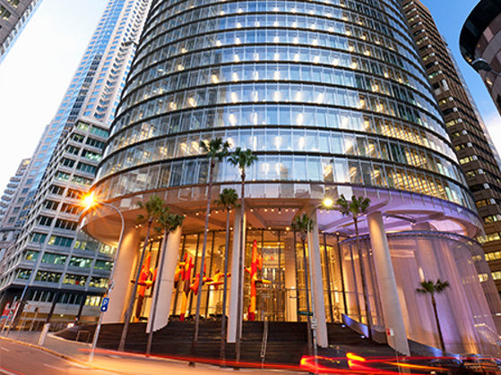 Image looking up at 1 Bligh Street exterior at dusk