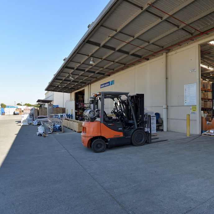 Exterior image of Banyo Industrial Estate warehouse facility with forklift