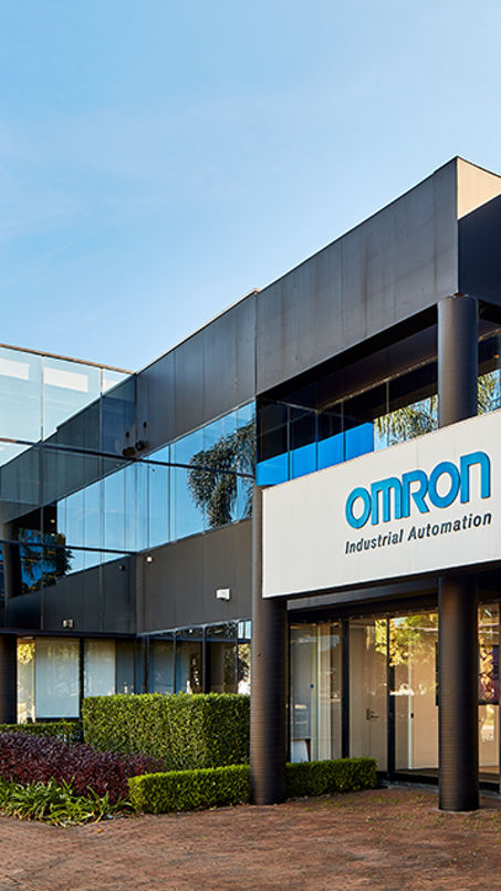Exterior image of Centrewest Industrial Estate office space with Omron signage