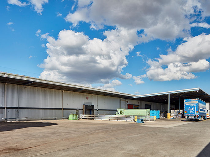Image of warehouse with recessed docks and awning 