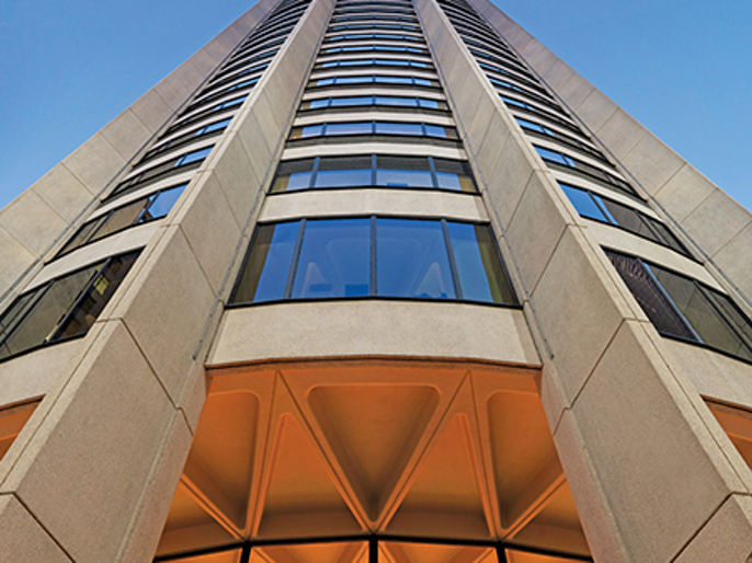 Exterior image of Australia Square Sydney office tower looking up in the evening light