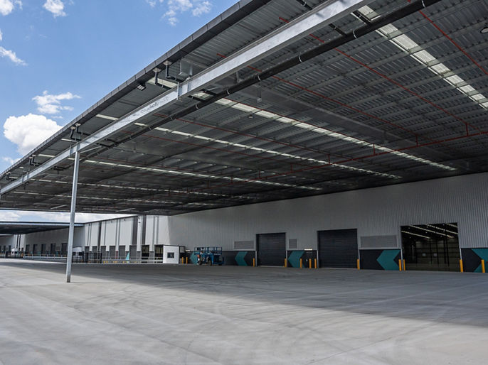 External warehouse image of hardstand with roller shutters