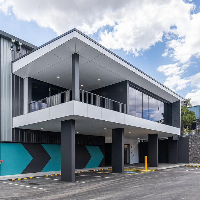 External building image of mezzanine office and car parking