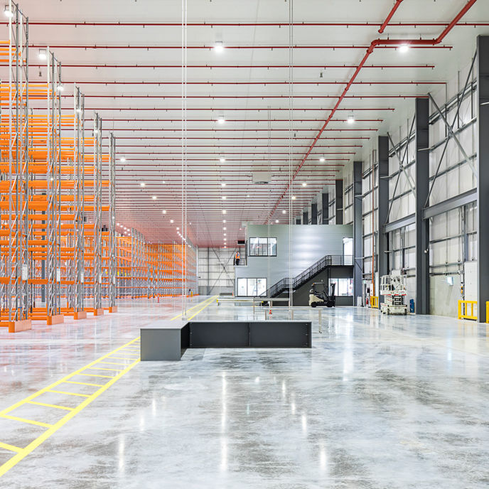 Image of warehouse exterior at night time