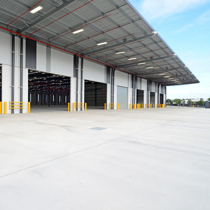 Exterior image of 50 & 70 Radius Drive warehouse facilities and large awning