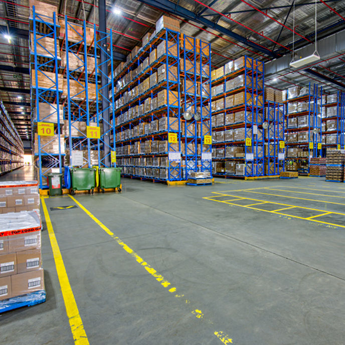 Interior image of 52 Holbeche Road distribution centre warehouse with large boxes in pallet rack