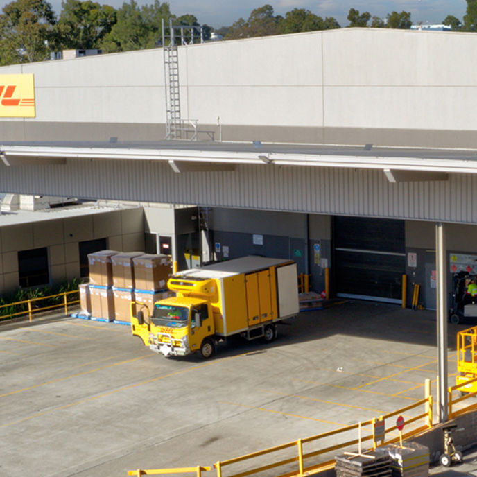 Aerial image of 52 Holbeche Road distribution centre warehouse facilities and loading dock with DHL overhead signage