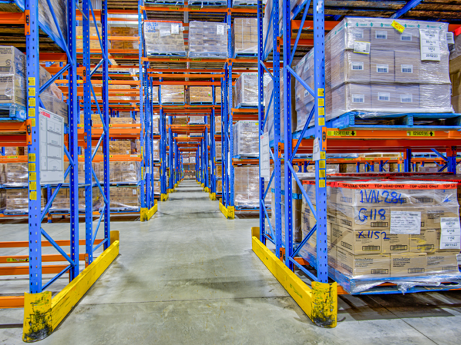 Interior image of 52 Holbeche Road distribution centre with boxes stored on pallet racks