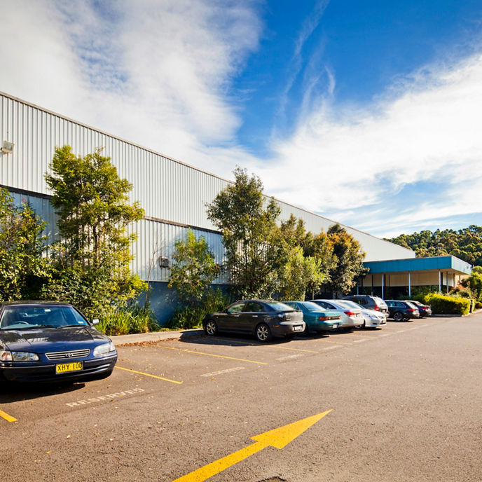 Exterior image of 93 Williamson Road warehouse facility and car park bays 