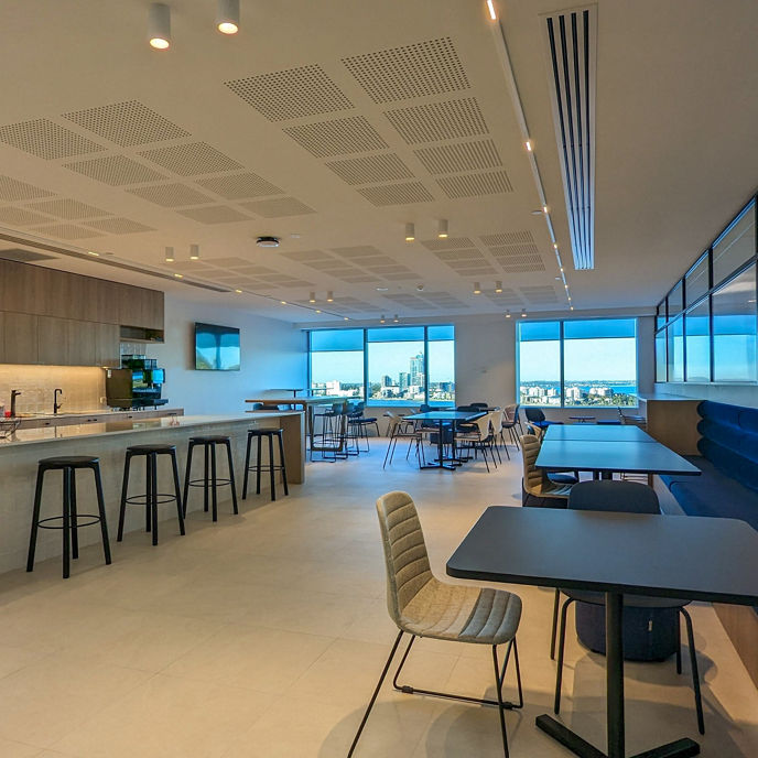 Interior image of Alluvion office suite kitchen facilities with tables and chairs