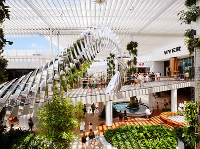 Interior image of Westfield Warringah Mall Sydney open air shopping centre with retail stores and customers shopping 