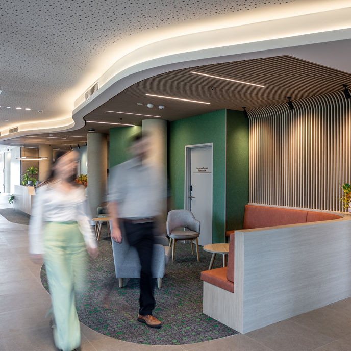 Reception area at Cockburn Mental Health Clinic with two blurred people walking past