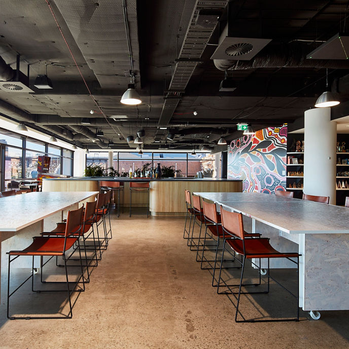 Image of kitchen and breakout space at Bond One with views of Sydney Harbour Bridge
