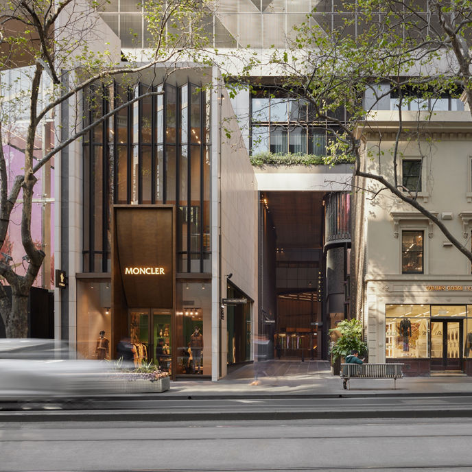 The front of 80 Collins Street in Melbourne, with two stores on either side