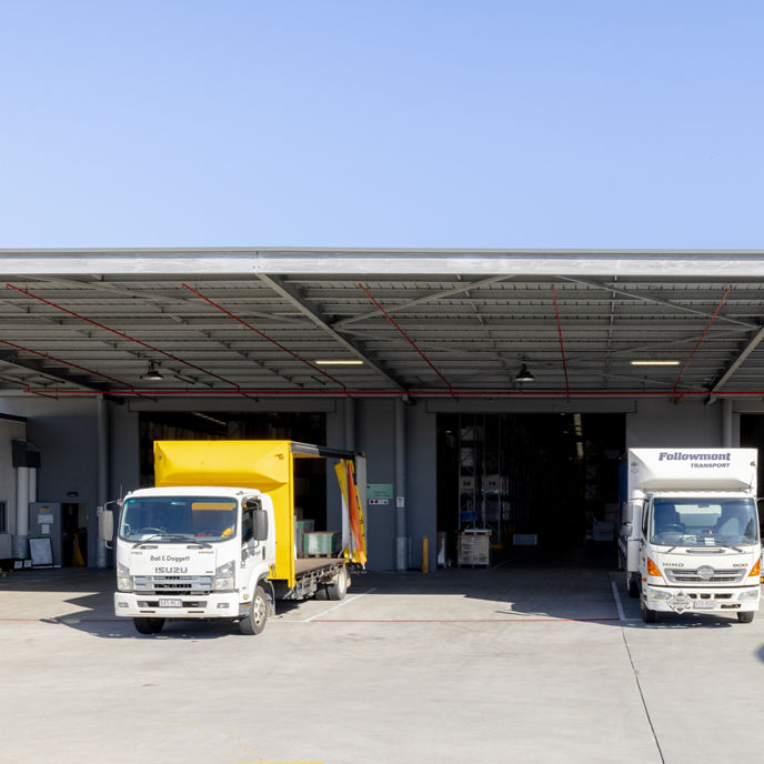 External image of 7 French Avenue warehouse operational loading dock with roller shutter doors and trucks