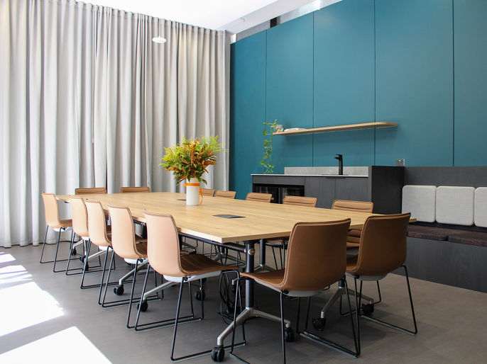 Interior image of Alluvion office suite conference room with kitchenette