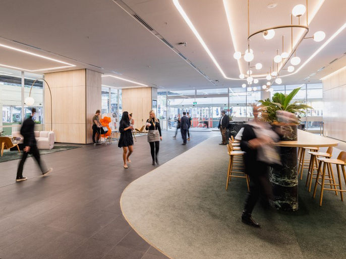 Interior image of 123 Albert Street lobby space with office workers