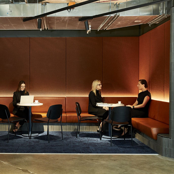 Interior image of Clubhouse kitchen and breakout facilities with office workers 