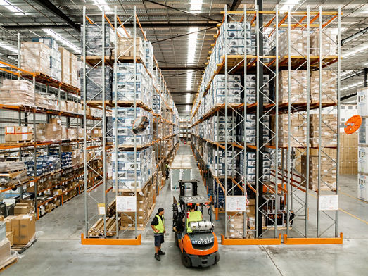 Image of the interior of an industrial estate with people working 