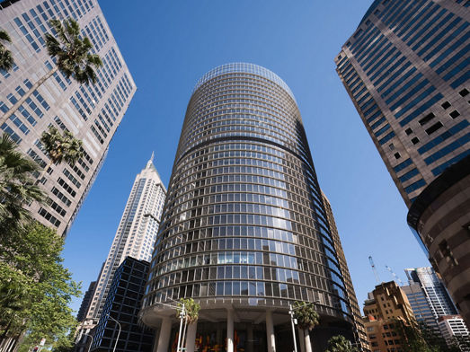 Wide angle exterior image looking up at 1 Bligh Street Sydney full height office tower within Sydney CBD