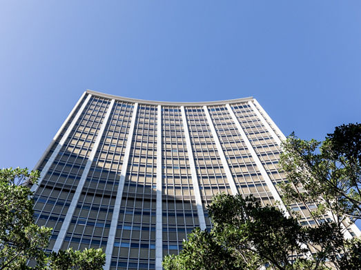 Wide angle exterior image looking up at 33 Alfred Street Sydney office tower facade after redevelopment 