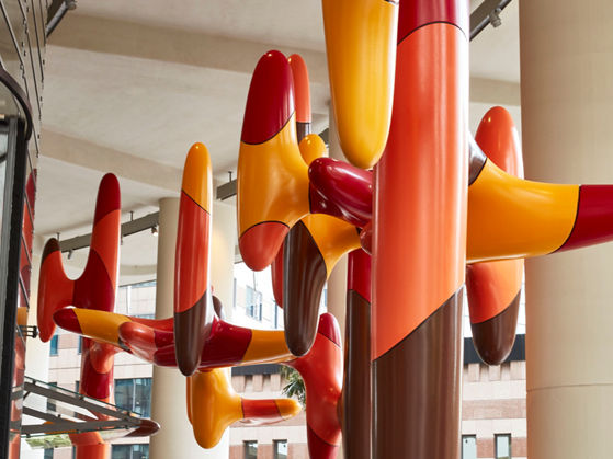 Image of people at lobby cafe and large public artwork at 1 Bligh Street