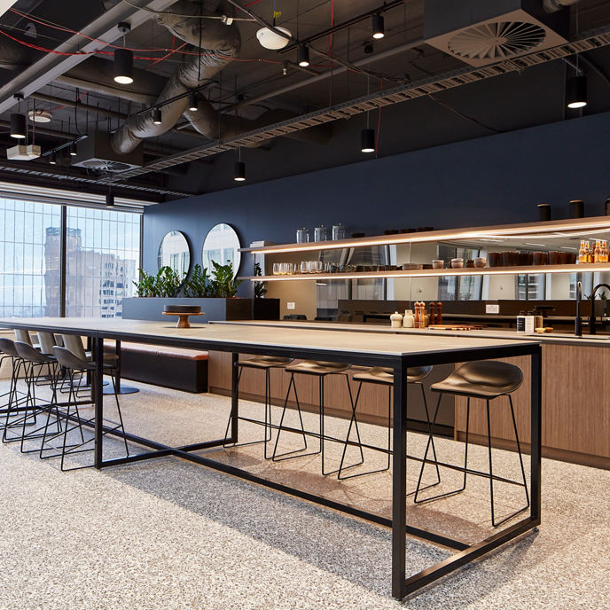 360 Collins Street kitchen facilities with bar tables and seating options