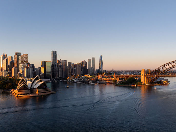 Wide angle image of Gateway precinct within Sydney Harbour and Sydney CBD skyline with Opera House and Harbour Bridge 