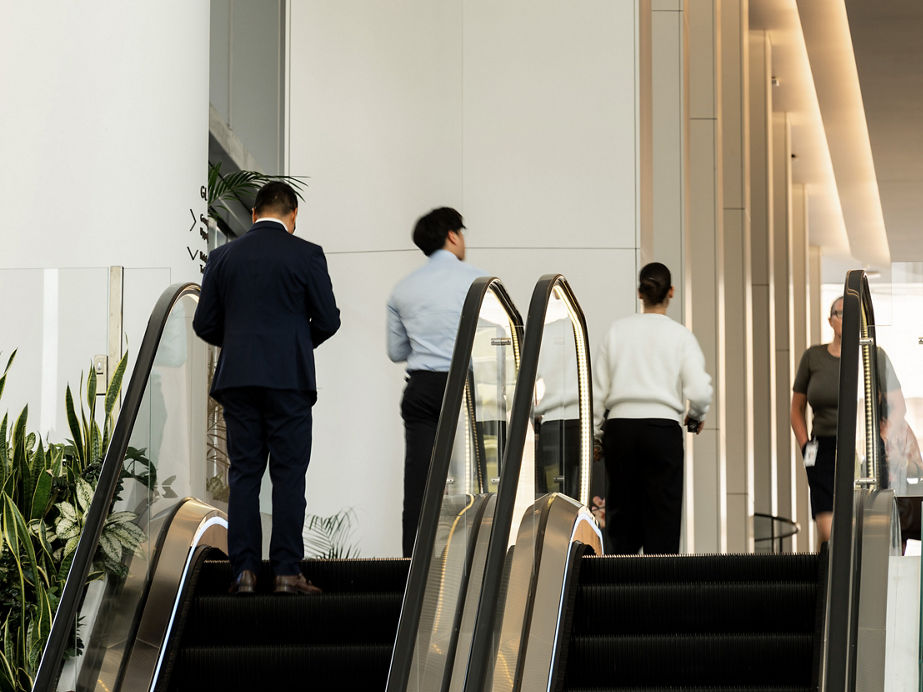 Quay quarter tower people on escalators