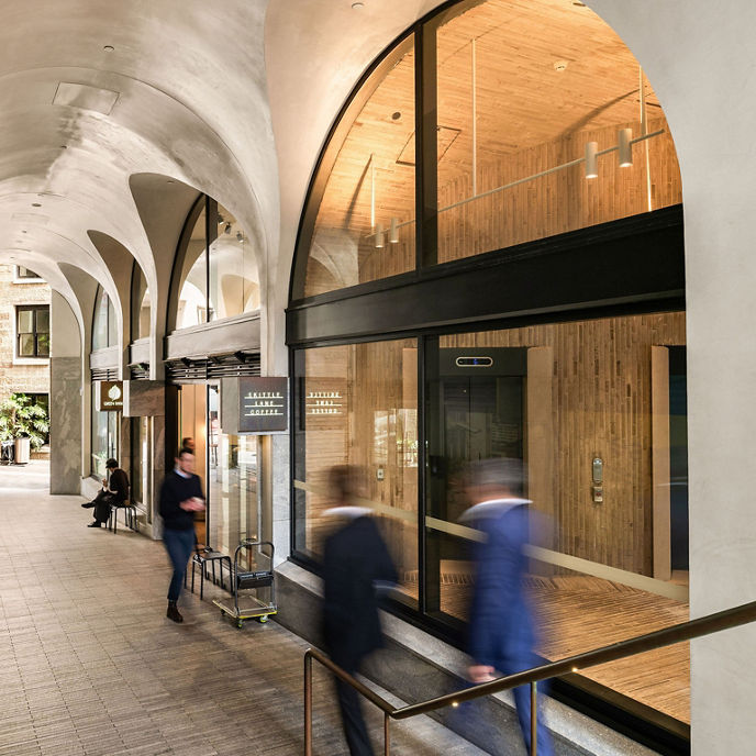 Interior image of 100 Mount Street lobby cafe with customers dining