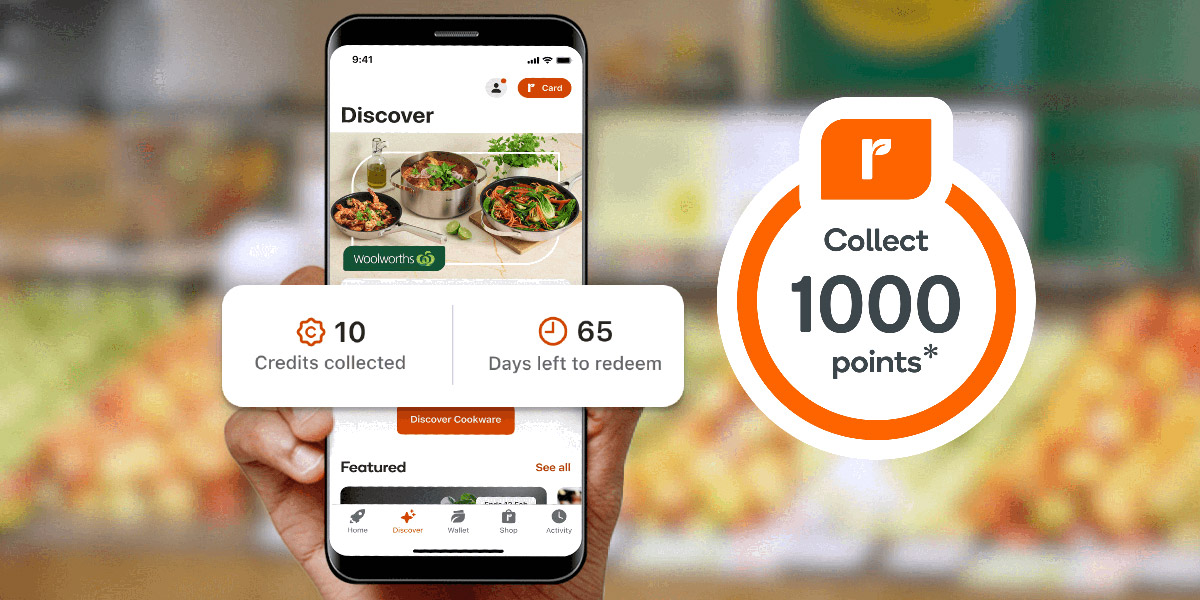 A hand holding a smartphone showing a Woolworths rewards app interface for a cookware promotion