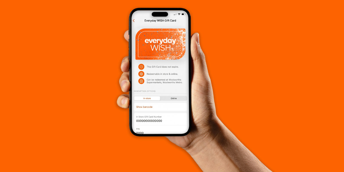 A hand holding a smartphone displaying the Everyday Gifting page.